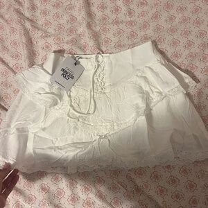 White mini skirt